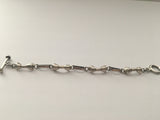 Delightful Sterling Silver Bow Tie Link Bracelet