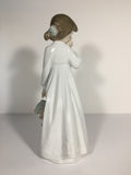 Nao Figurine # 1108 Girl with Rag Doll