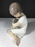 Royal Copenhagen " Girl with Doll " Figurine