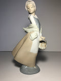 Nao by Lladro Porcelain Figurine - Girl with Basket # 4834