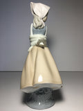 Nao by Lladro Porcelain Figurine - Girl with Basket # 4834